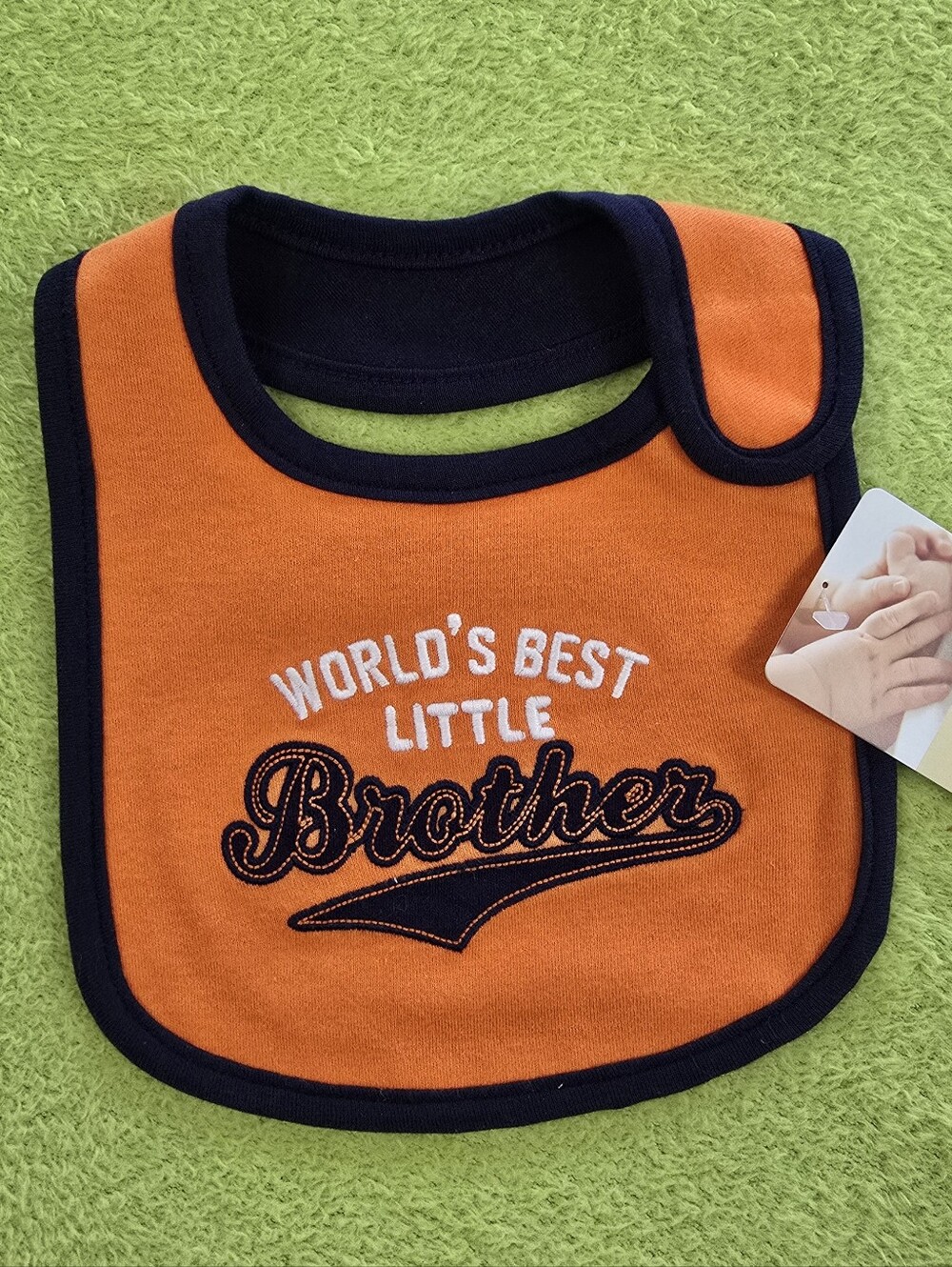 NWT  NEWBORN + Up BOYS BIB "World's Best Little Brother"Orange & Navy Blue (M